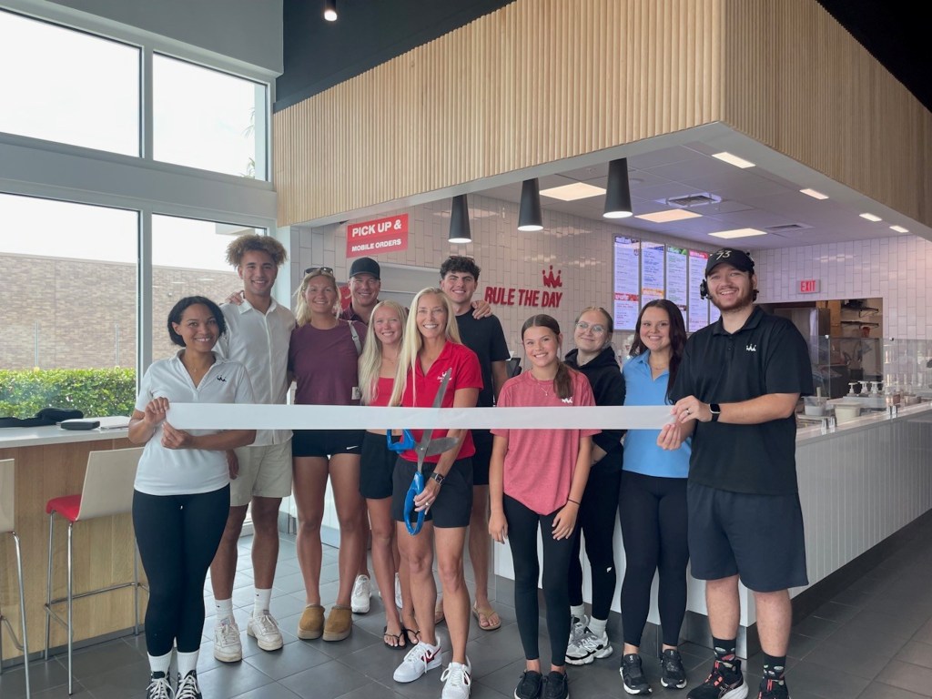 Lorraine Pater (center) at the grand opening of a Smoothie King location. Credit: Lorraine Pater / Smoothie King 