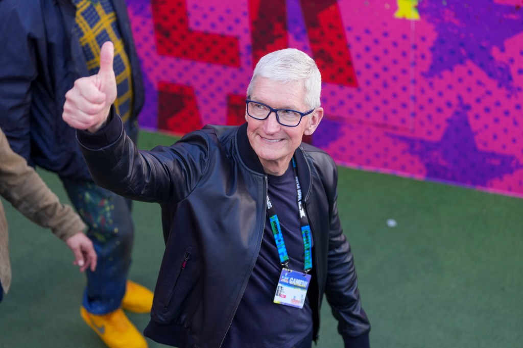 SANTA CLARA, CALIFORNIA - FEBRUARY 8: CEO of Apple Inc. Tim Cook walks up before the NFL Super Bowl LX football game between the Seattle Seahawks and New England Patriots at Levi's Stadium on February 8, 2026 in Santa Clara, California. (Photo by Perry Knotts/Getty Images)